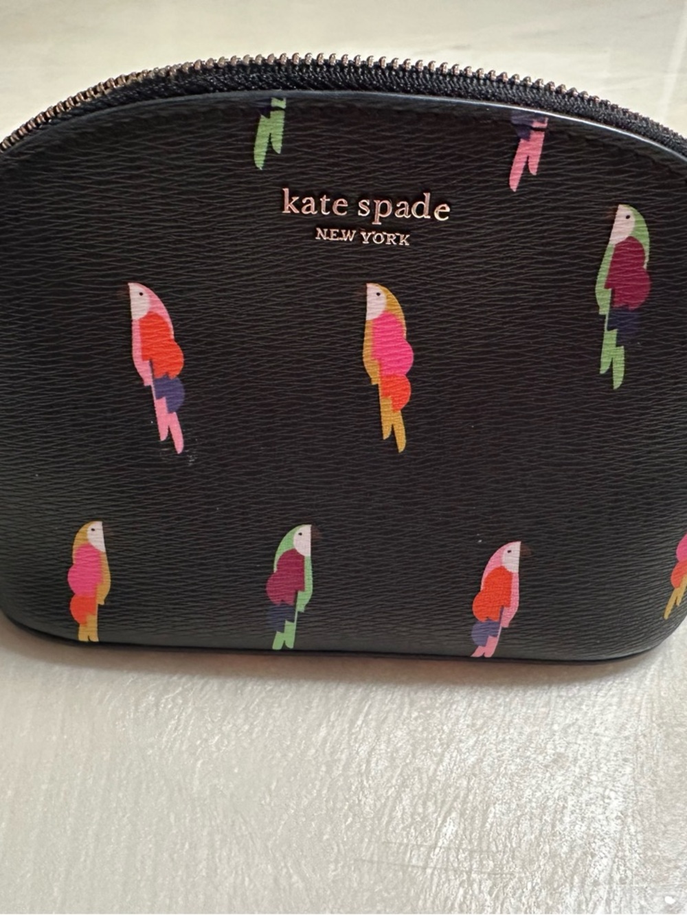 kate spade black floral-embossed small pouch with gold zipper